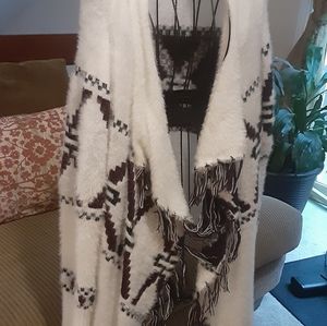 Sweater topper.